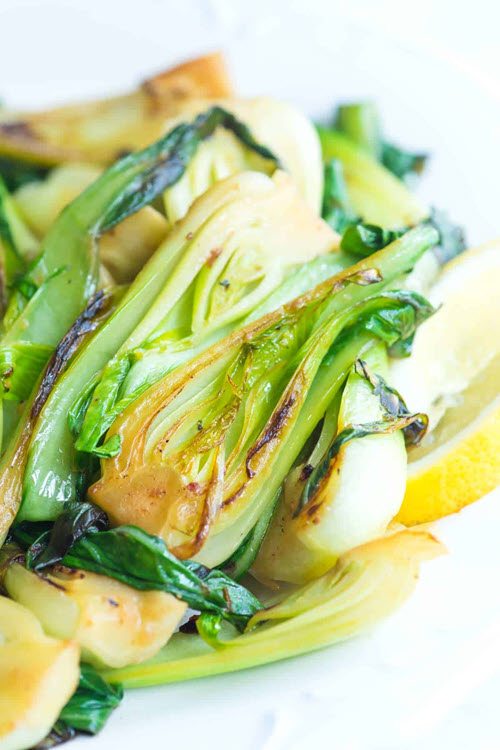 Bok choy that has been sauteed in lemon and garlic and served as a side dish