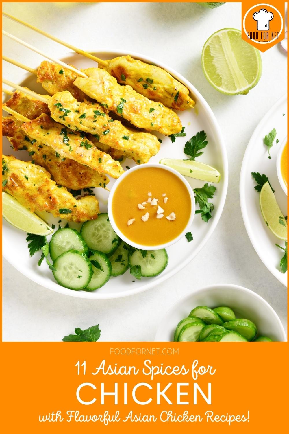 Asian Spices for Chicken. a top view image of a beautifully plated chicken satay with a small bowl of peanut sauce and sliced cucumber, around it is a halved lime, small bowl of sliced cucumber, and a loose cilantro leaf