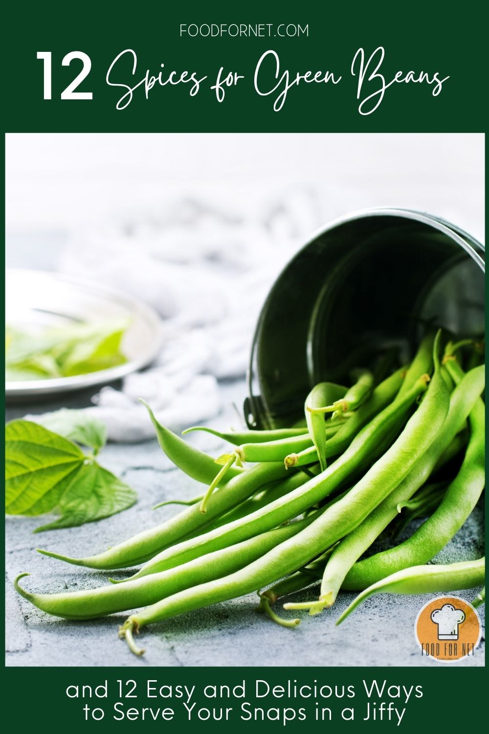 Spices for Green Beans. a closeup image of fresh green beans spilling out of a metal pail with green leaves and white plate with leaves and white cloth at the back