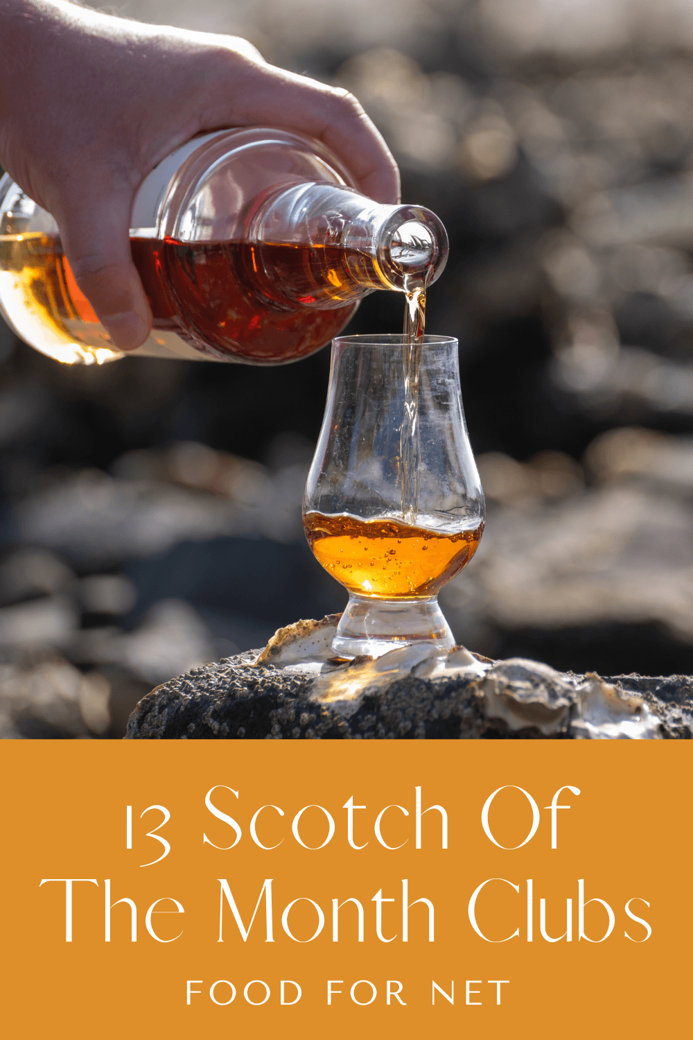 Scotch whiskey being poured into a glass as part of a Scotch of the month club