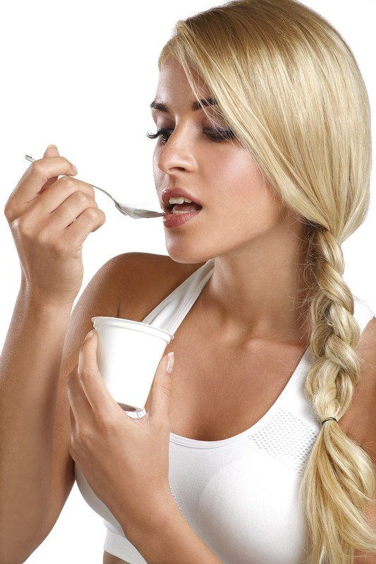 Girl eating yogurt