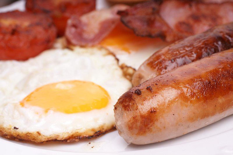 Breakfast sausages with an egg