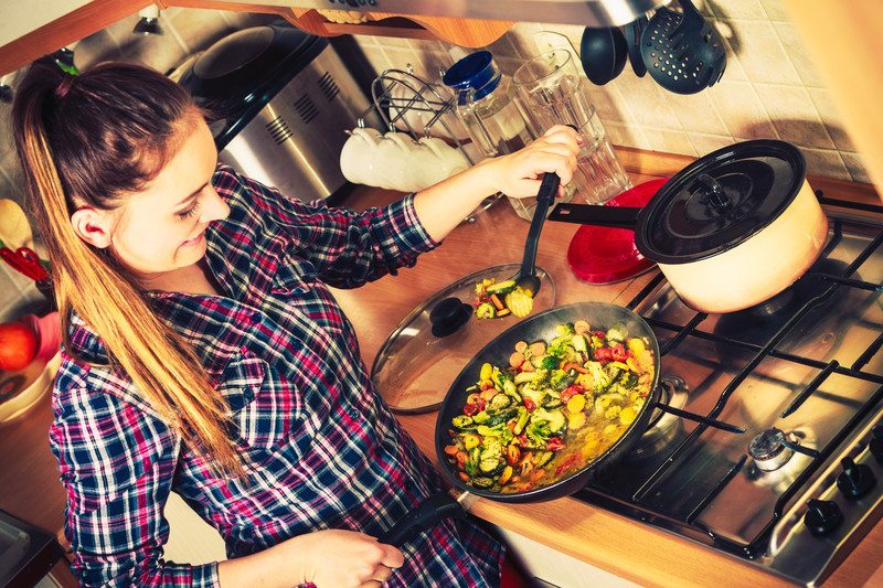 woman frying lunch