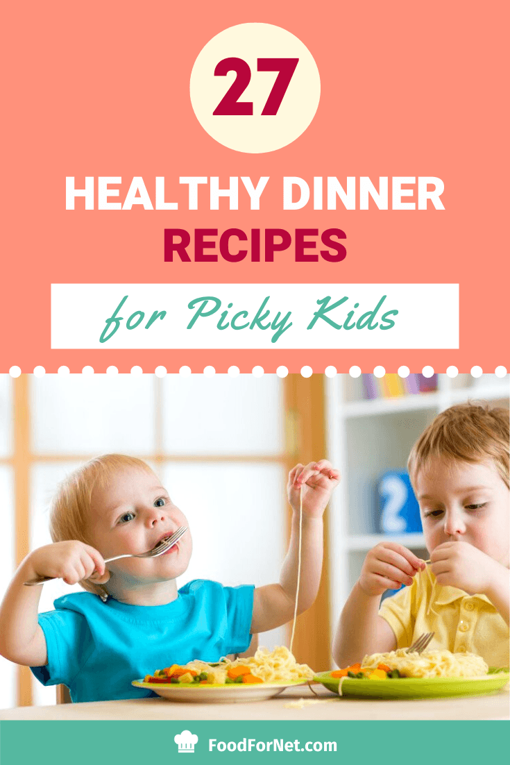 two picky kids eating dinner of pasta and vegetables