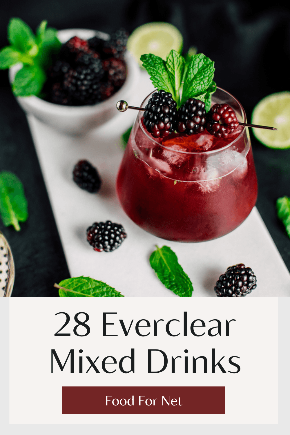 A white plate with blackberries and sage leaves, with a small bowl of blackberries in Everclear mixed drinks