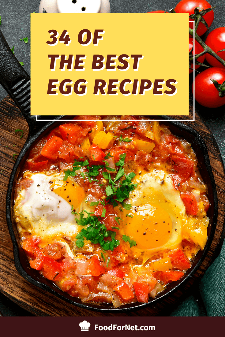 egg recipe cooked in cast iron skillet with tomatoes, peppers, and garnished with cilantro