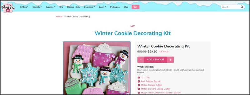 A website screenshot showing a collection of winter-themed cookies, like snowmen and mugs of hot chocolate