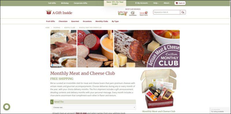 screenshot of A Gift Inside Monthly Meat and Cheese Club's web page, with dominantly white page with pale green banner on top bearing a menu, underneath it is the website's name and logo followed by the main menu, the page contains a banner image of different cured meats along with the details of the club subscription plans