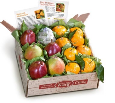 A box with various mandarins and pears