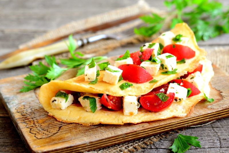 A Greek omelet with feta and cherry tomatoes