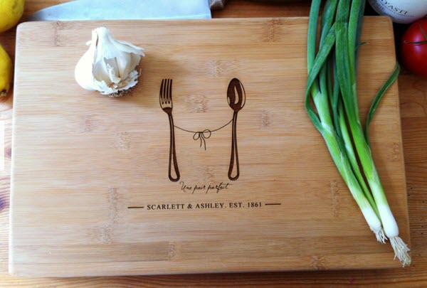 A-Perfect-Pair-Cutting-Board | Food For Net A cutting board with a fork and spoon engraved upon it.