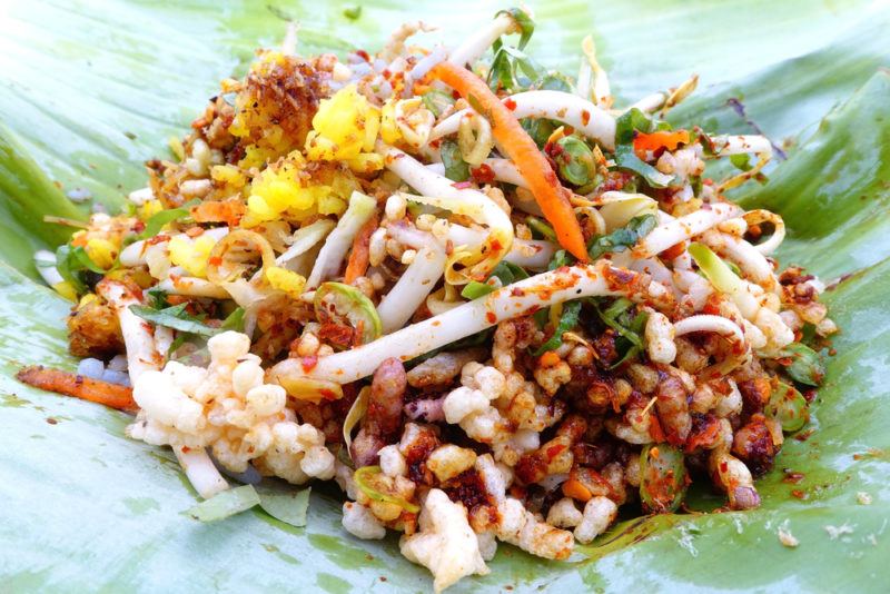 A Thai khao yam salad on a leaf