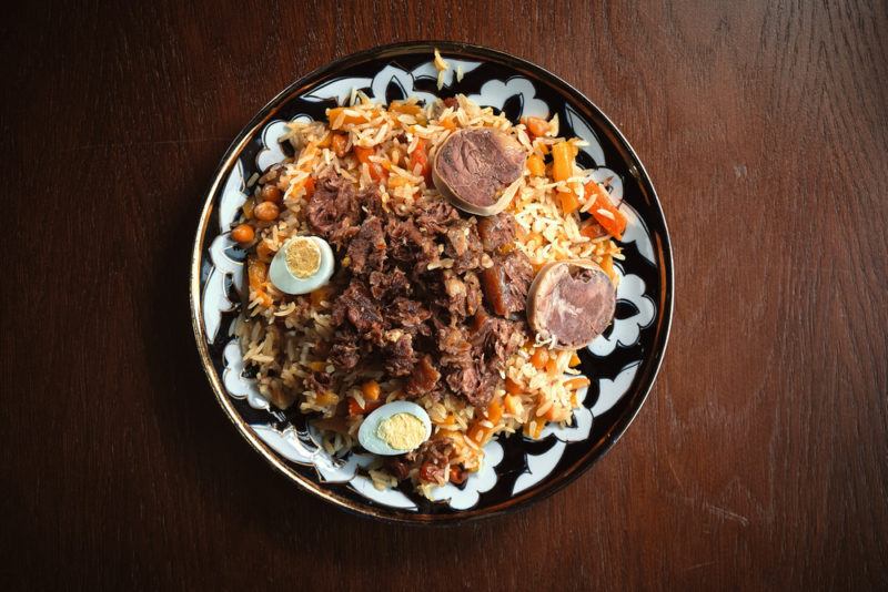 A blue and white plate with plov