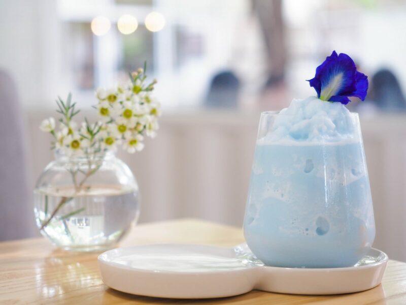 A light blue frozen slushie cocktail