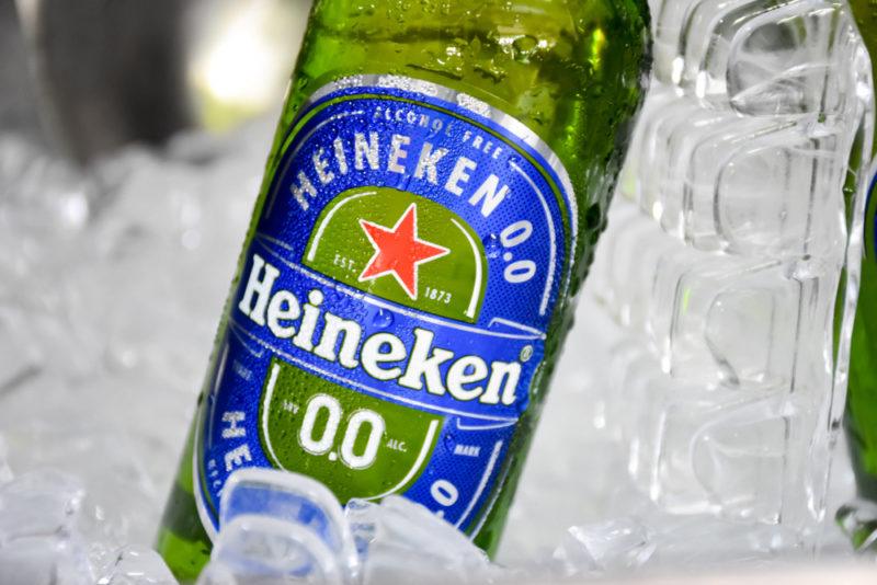 A bottle of 0% Heineken beer nestled in ice