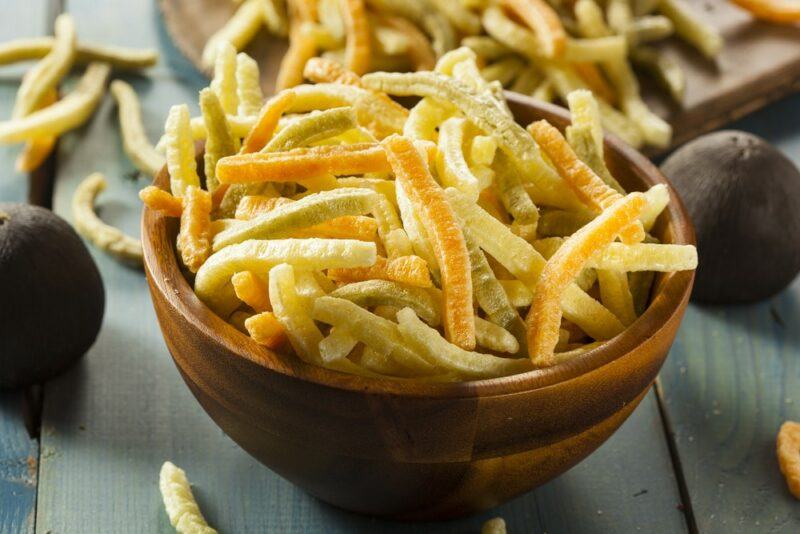 A brown bowl filled with veggie straws