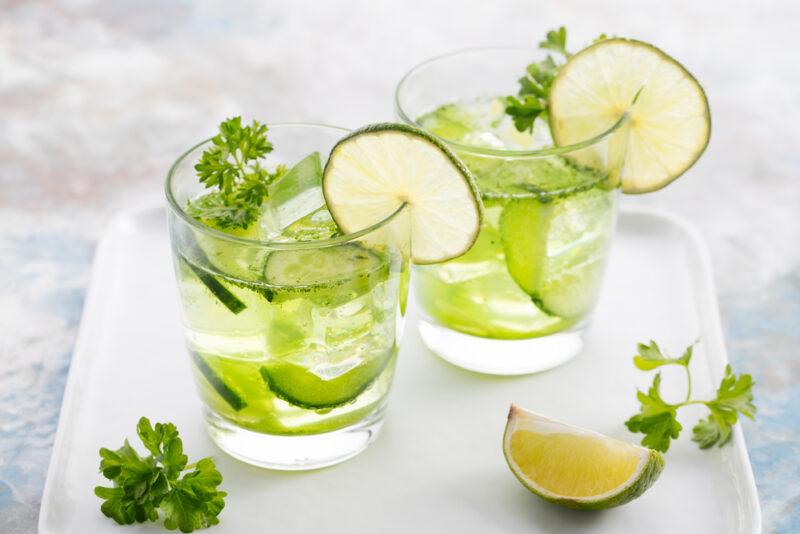 A cocktail made with parsley juice, lemons, and lime