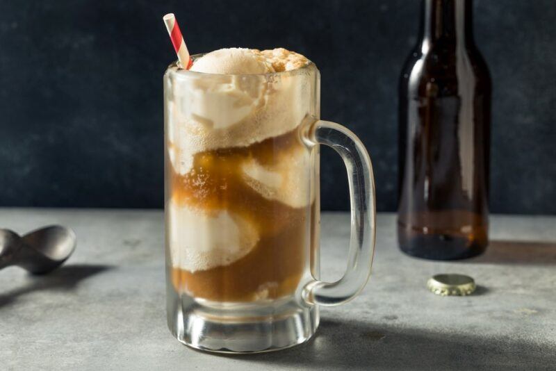 A pint glass containing a dirty root beer float