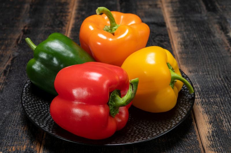 Four different capsicums each a different color