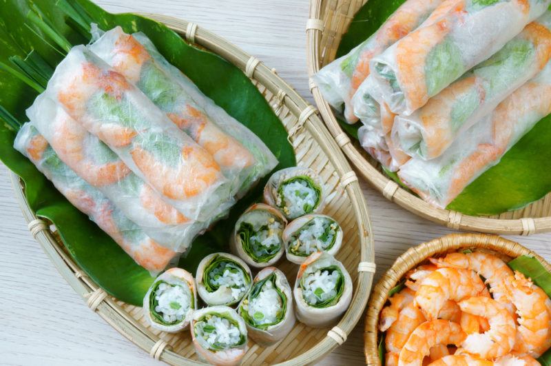 Two bamboo trays with fresh Vietnamese spring rolls