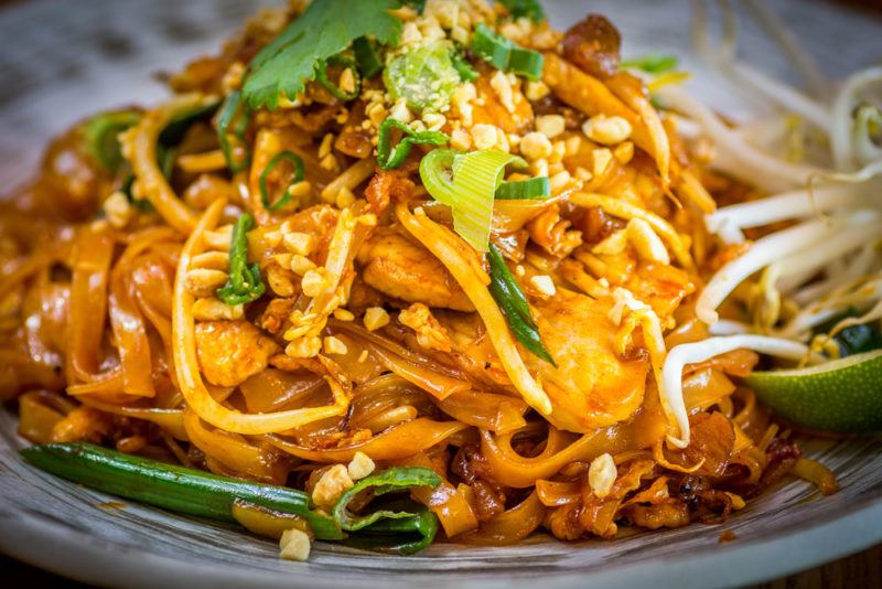 A white dish of pad Thai that's been made in the United States