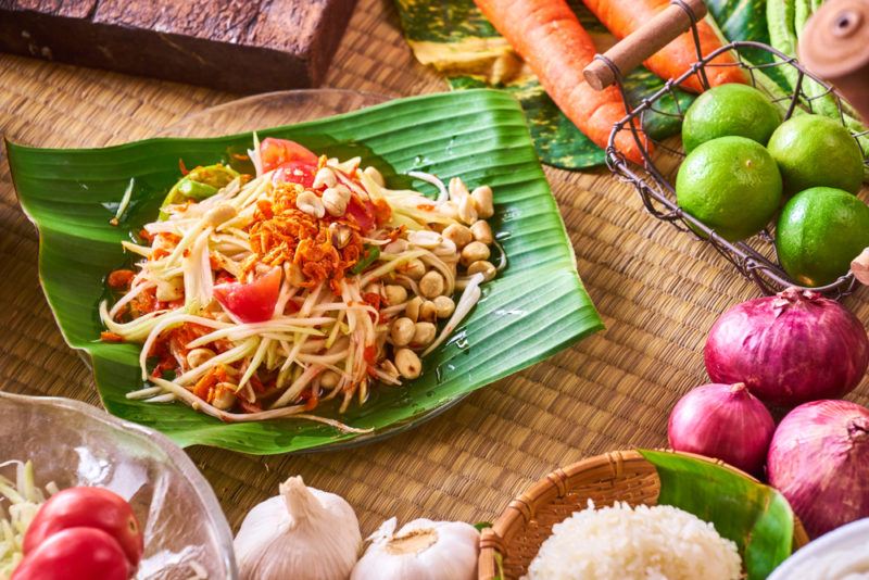 A som tam papaya salad on a banana leaf