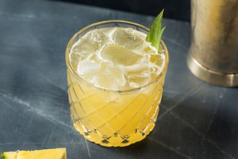 A glass filled with a bull rider cocktail and plenty of ice