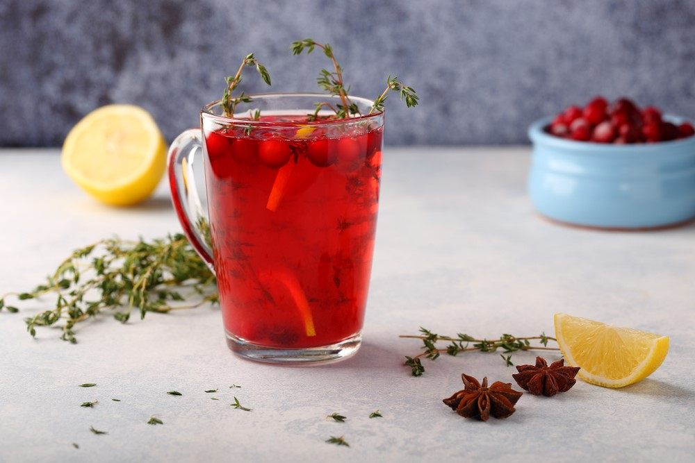 A glass mug containing a Russian drink called vzvar