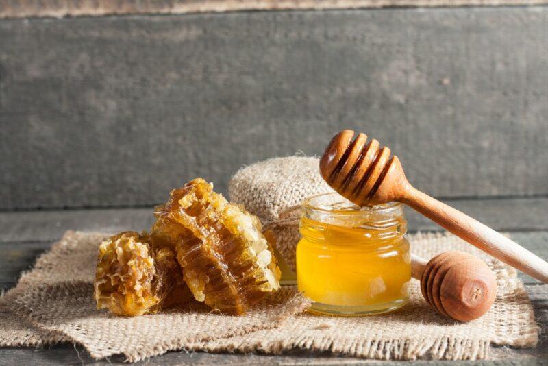 A table with a stirrer next to a honeycomb