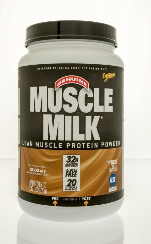 A container of Muscle Milk protein powder isolated against white