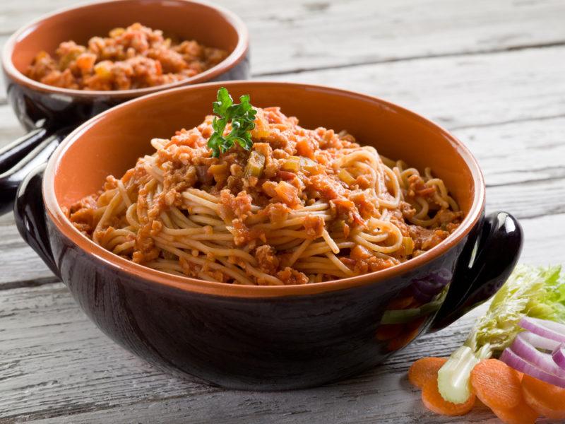 A large bowl and a small bowl with vegan pasta