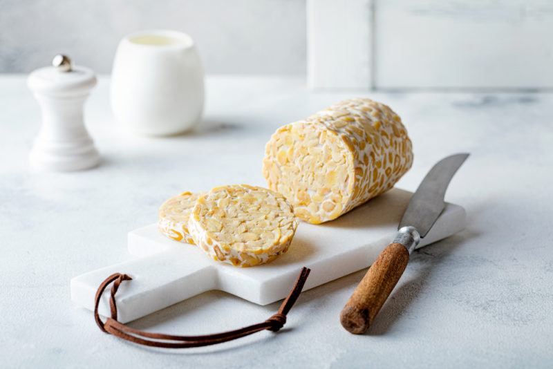 A log of tempeh that's been sliced