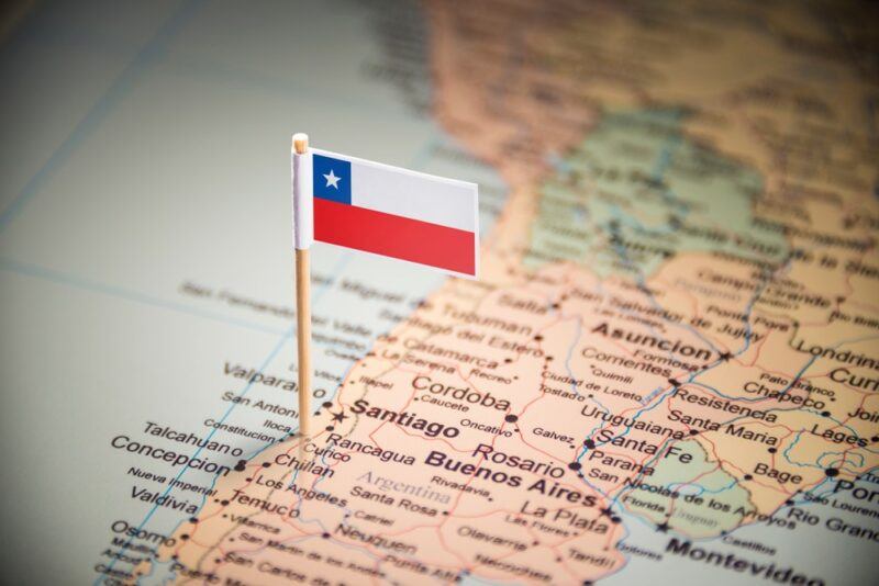 A map of Chile marked with a flag of the country