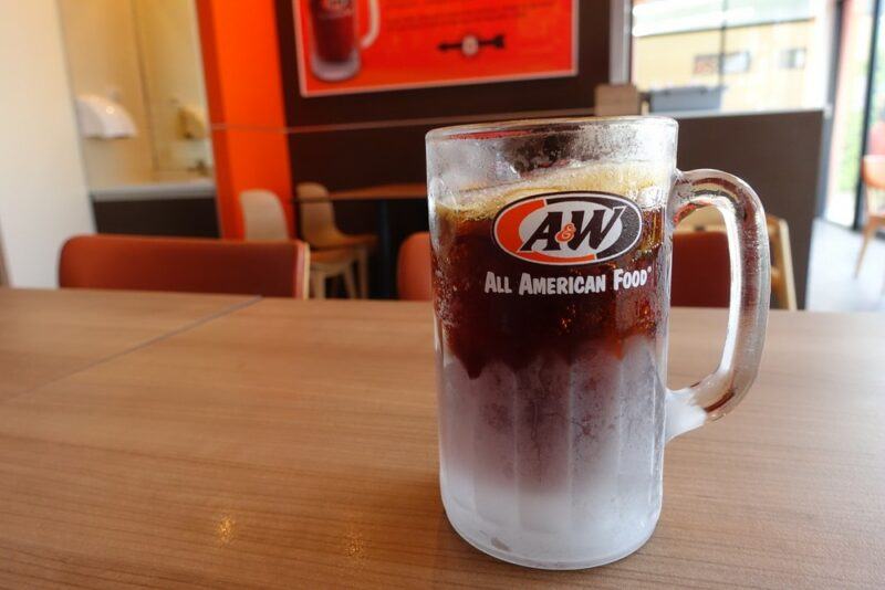 A mug of root beer in an A&W mug, used as part of a detto bomb shot