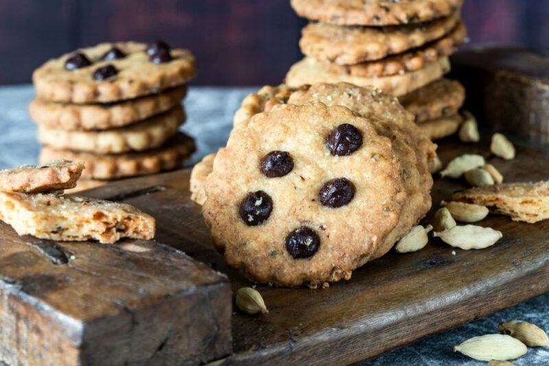 A pile of chocolate, orange, and cardamom cookies