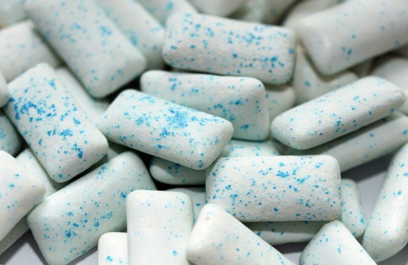 Blue and white sugarfree chewing gum on a table