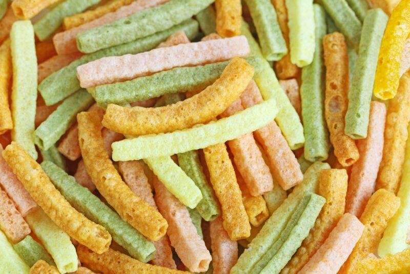 A pile of veggie straws of different colors