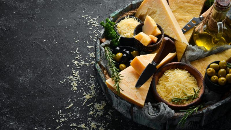 A selection of cheeses, olives and olive oil