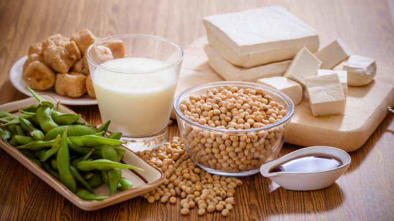 Various soy products, including soybeans, miso, edamame, soy milk, and tofu