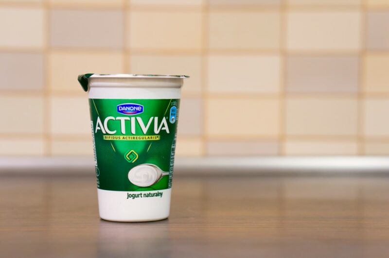 A single tub of Activia yogurt on a kitchen counter