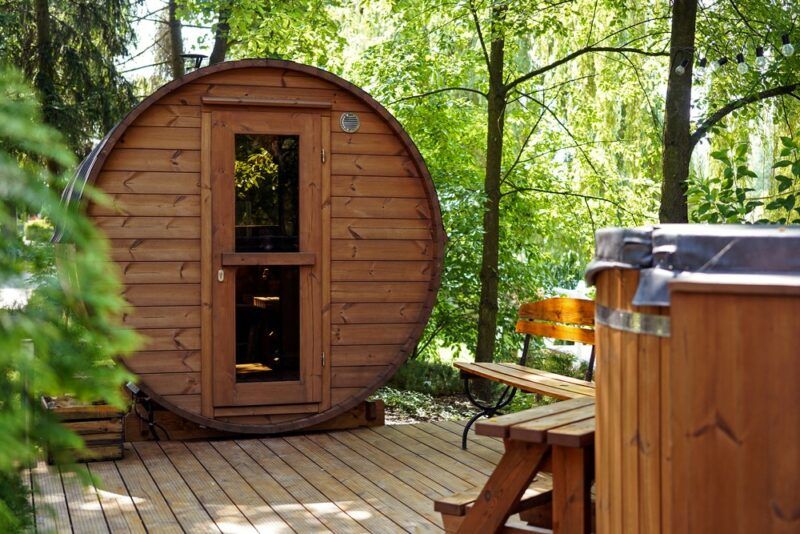 Someone's backyard with a circular personal sauna