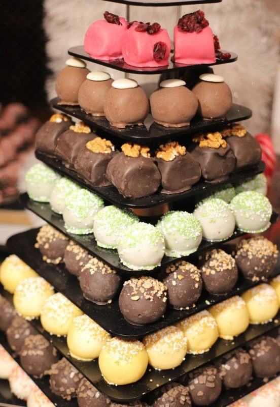 A tower of chocolates with different toppings for a wedding