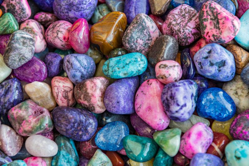 A variety of polished stones that look like galaxies as part of rock and gem monthly clubs