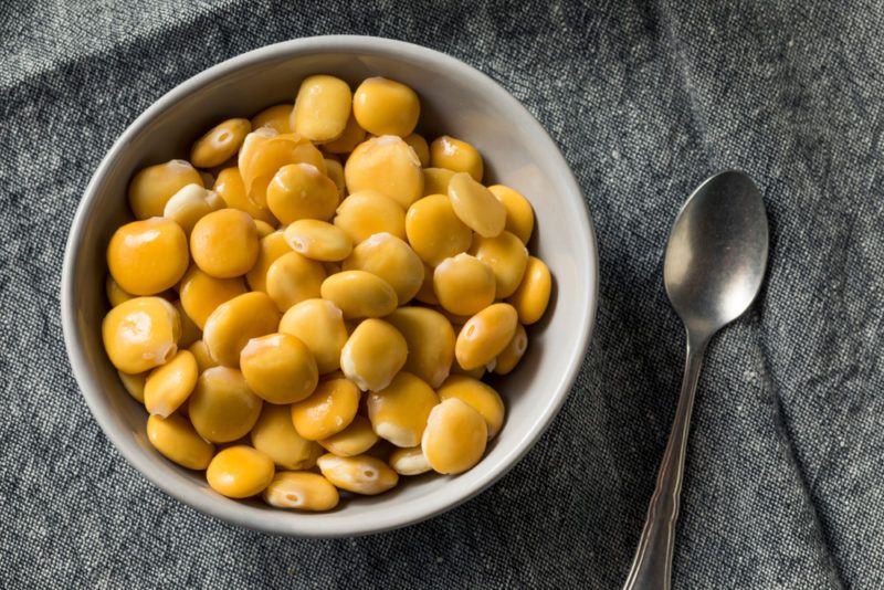 A white bowl of lupini beans