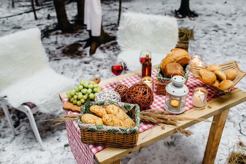 A traditional picnic on a table in the snow