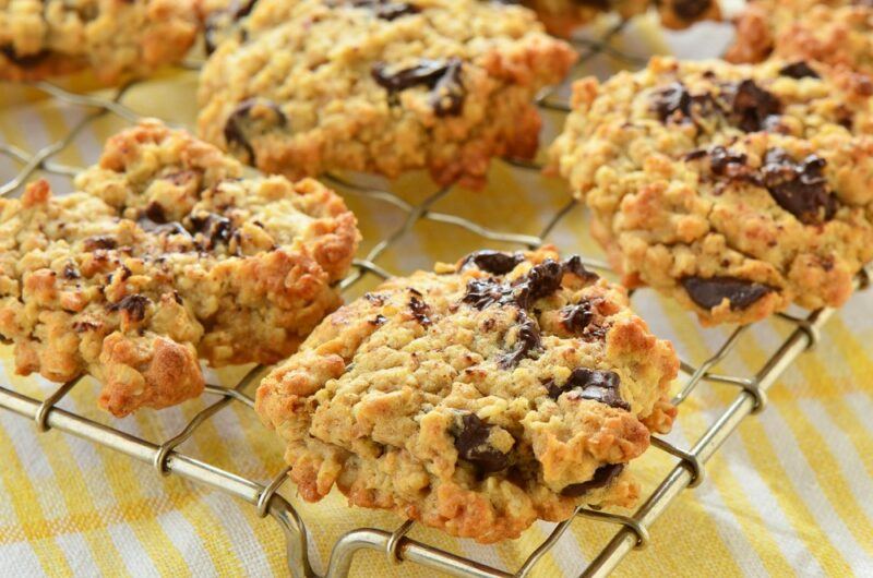 A wire baking tray with chunky cookies that use asparagus as an ingredient