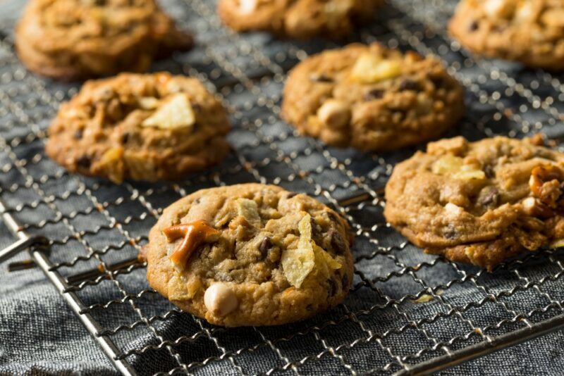 A wire frame with a collection of home cooked cookies called garbage cookies