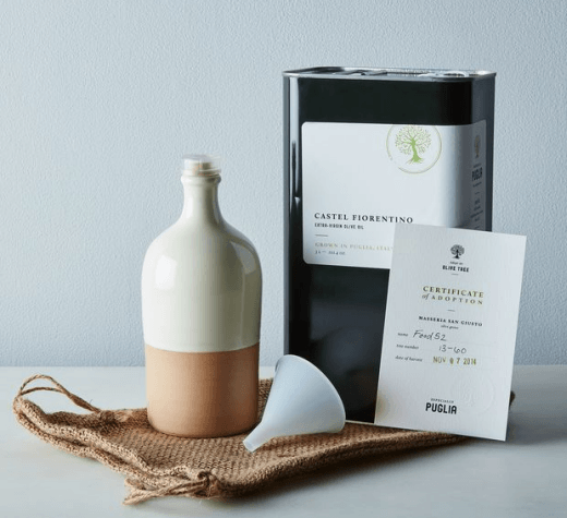 Adopt An Olive Oil Gift Box and Subscription | Food For Net A jar of olive oil with a bottle