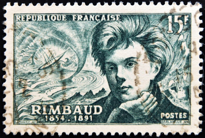 An old stamp featuring Rimbaud and marks from postage