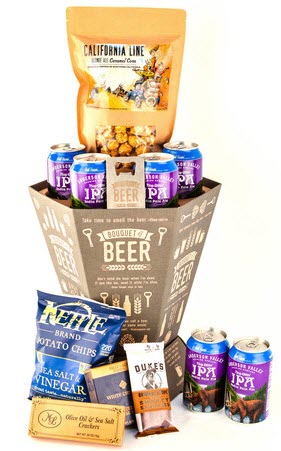 A beer bouquet including various cans of beer and snacks.